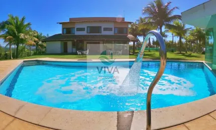 Casa duplex em condomínio composto por 5 suítes com área de lazer á venda no bairro lameirão, guarapari-es  - realize negócios imobiliários.