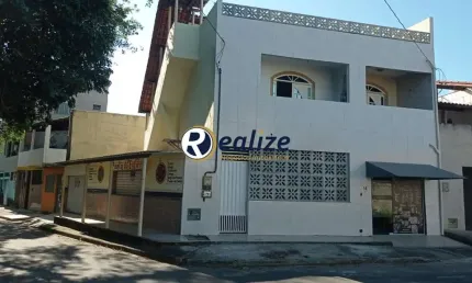 Casa composta por 3 quartos e 2 pontos comerciais  à venda no Bairro Santa Mônica, Guarapari-ES - Realize Negócios Imobiliários.