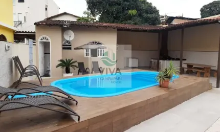 Casa  composta por 4 quartos com área de lazer á venda no bairro ipiranga, guarapari-es - realize negócios imobiliários.