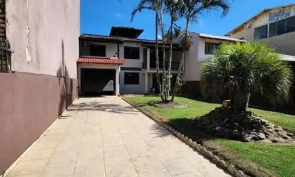 Casa para Venda em Torres, Igra Sul, 4 dormitórios, 1 suíte, 2 banheiros, 2 vagas