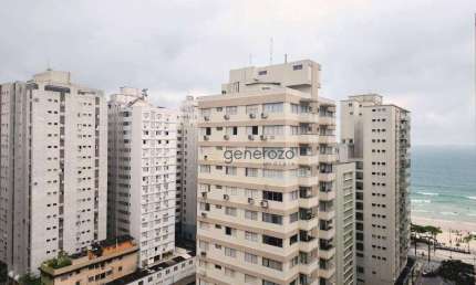 Apartamento a venda na praia das Pitangueiras, 03 dormitórios, 02 vagas de garagem, sacada e vista para o mar