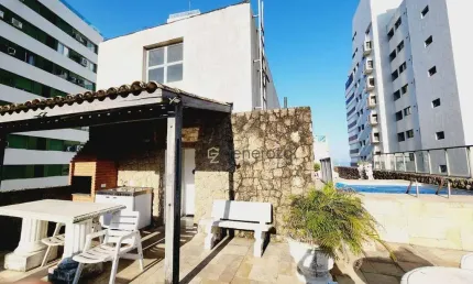 Cobertura a venda na praia das Astúrias, prédio frente ao mar, 03 suítes, garagem e lazer