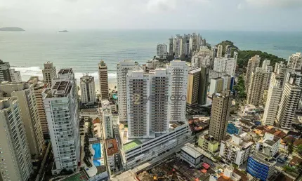 Apartamento a venda na praia das astúrias, prédio novo, 02 dormitórios, 02 vagas de garagem