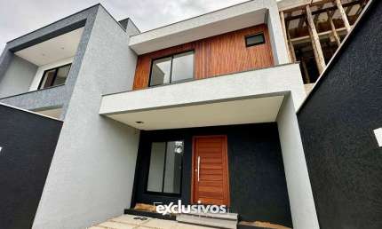 Sobrado geminado com 1 suíte mais 2 quartos à venda no bairro Saguaçu por R$ 720.000,00
