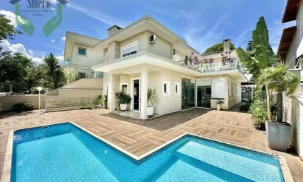 Sobrado com 4 dormitórios, 358 m² - venda por R$ 2.450.000,00 ou aluguel por R$ 14.999,35/mês - Golf Village - Carapicuíba/SP