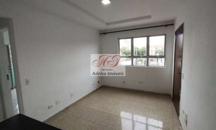 Apartamento de 2 quartos com suíte e vaga de garagem no Macuco, Santos-SP: seu novo lar espera por você!