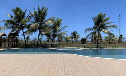 Village 2 quartos suites 70m2 frente mar em Itacimirim