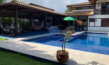 Casa em condominio fechado em Praia do Forte, 5 suites, a 10 min da praia e 5 min da vila.