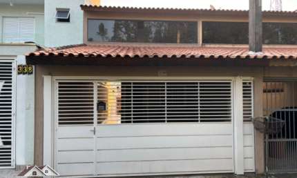 Lindo sobrado de 2 suítes e 2 vagas em Laranjeiras !
