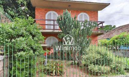 Casa à venda, 204 m² por R$ 800.000,00 - Santa Maria Goretti - Porto Alegre/RS