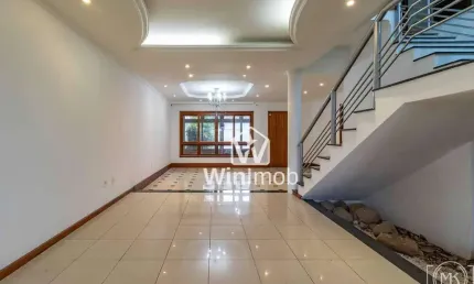 Casa com 3 dormitórios à venda, 275 m² por R$ 950.000,00 - Santa Fé - Porto Alegre/RS