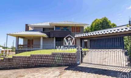 Casa com 3 dormitórios à venda, 258 m² por R$ 1.290.000,00 - Jardim Planalto - Porto Alegre/RS