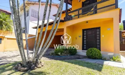 Casa com 4 dormitórios à venda, 210 m² por R$ 850.000 - Condomínio Cantegril- Viamão