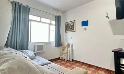 Apartamento 1 dormitório 1 vaga mobiliado prédio frente pro mar e vista lateral
