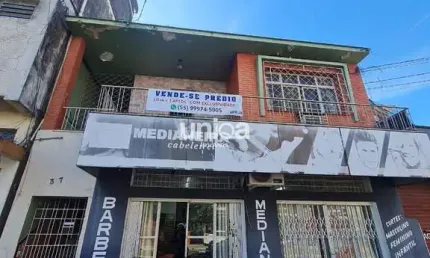 Prédio com loja térrea + 03 aptos na avenida ângelo bolson 367 santa maria rs