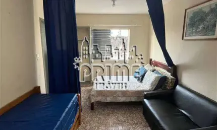 SALA LIVING À CERCA 100 METROS DO MAR, LOCALIZADA NO BAIRRO OCIAN EM PRAIA GRANDE.