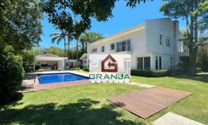 Casa com 4 dormitórios, 541 m² - venda por R$ 3.950.000,00 ou aluguel por R$ 22.100,00/mês - Granja Viana - Jandira/SP