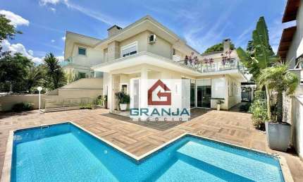 Casa com 4 dormitórios, 300 m² - venda por R$ 2.450.000,00 ou aluguel por R$ 15.000,00/mês - Golf Village - Carapicuíba/SP