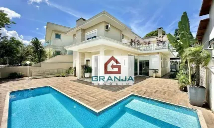 Casa com 4 dormitórios, 300 m² - venda por R$ 2.450.000,00 ou aluguel por R$ 15.000,00/mês - Golf Village - Carapicuíba/SP