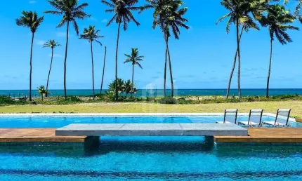 Alphaville guarajuba - lote frente mar pé na areia, 50m do mar, oportunidade. pronto para construir. exclusivo.