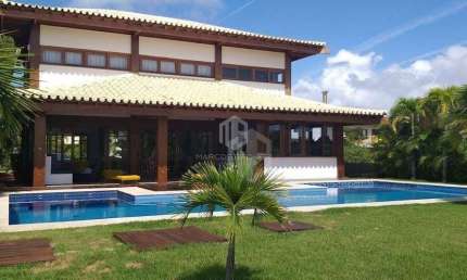 Casa de Luxo à Venda no Condomínio Acácias – Praia do Forte | 4 Suítes | Porteira Fechada | Piscina e Área Gourmet!