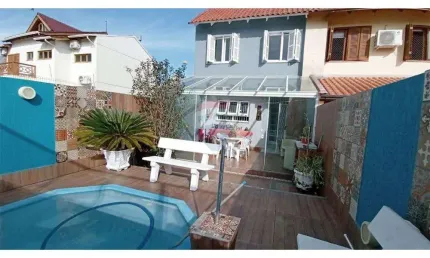 Casa com 4 quartos à venda na Rua Antonio Delapieve, 116, Mário Quintana, Porto Alegre