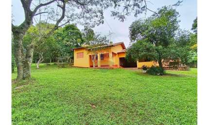 Casa com 3 dormitórios sendo 1 suíte com 10 vagas de garagem no bairro Tarumã em Viamão!