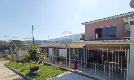 Casa de 7 dormitórios, com 2 vagas de garagem no bairro Santa Isabel em Viamão!