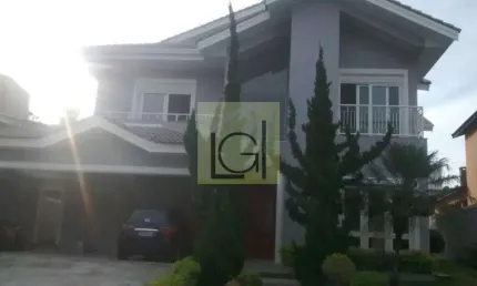Imóvel de luxo em condomínio exclusivo de Barueri-SP: casa com 4 suítes, 3 salas e 455m² de área