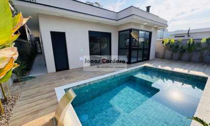 Casa térrea padrão à venda no condomínio Veredas, Mogi das Cruzes-SP: 3 quartos sendo 3 suítes, 4 vagas, piscina ampla e paisagismo. R$: 1.650.000