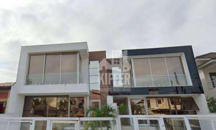 Casa de alto padrão com 3 suítes, lazer completo e garagem subterrânea – Camboinhas