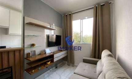 Apartamento com 2 quartos; cozinha e área de serviço planejada, balcão americano; e 1 vaga; em condomínio no bairro Vila Perracine em Poá/SP.