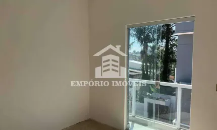 casa em condomínio com dois dormitórios e vaga de garagem em Tiradentes