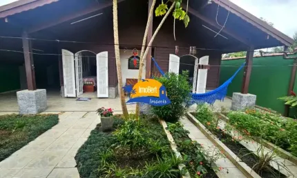 Casa à venda em Bertioga-SP, bairro Indaiá,  450 mts da praia, 3 quartos, 1 suíte, 2 salas, 3 banheiros, 4 vagas de garagem, 136,51 m²!