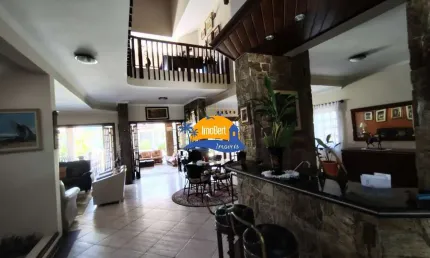 Luxuosa casa em condomínio fechado frente ao mar em bertioga-sp: 4 quartos, 4 suítes, 8 banheiros, 6 vagas, 630m².