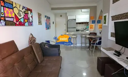 Apartamento à venda  na quadra da praia no Centro de Bertioga-SP: 2 quartos, 1 suíte, 2 salas, 2 banheiros e 70m² de área. Aproveite!