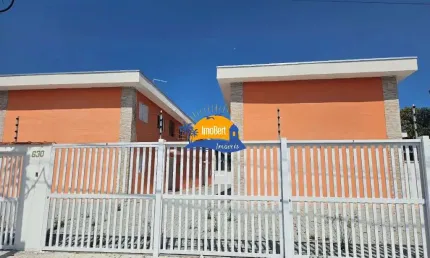 Casa de Condomínio à Venda em Bertioga-SP: 2 Quartos, 1 Sala, 1 Banheiro, 1 Vaga de Garagem.