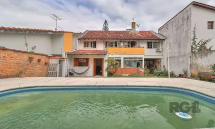 Casa a venda composta de 4 dormitórios no bairro jardim isabel em porto alegre