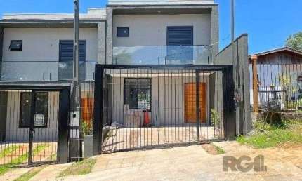 Casa Condominio em Porto Alegre, no bairro Tristeza, com 3 dormitório(s), e 3 banheiros, à venda.