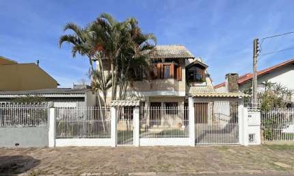 Casa com 4 quartos à venda na Avenida Guarujá, --, Guarujá, Porto Alegre