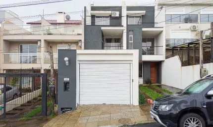 Casa com 3 quartos à venda na Rua Heitor Kramer, --, Guarujá, Porto Alegre
