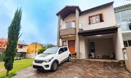 Casa em condomínio fechado com 3 quartos à venda na Rua Deputado Hugo Mardini, --, Passo das Pedras, Porto Alegre