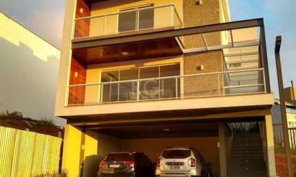 Casa para Venda - 200m², 3 dormitórios, sendo 1 suites, 2 vagas - Vila Nova, Porto Alegre