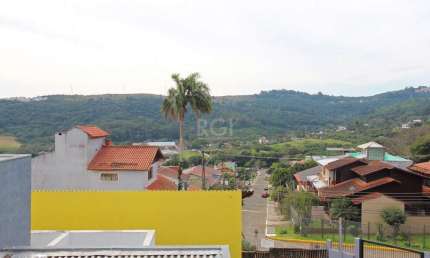Casa para Venda - 339m², 3 dormitórios, 2 vagas - Vila Nova, Porto Alegre