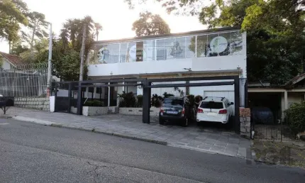 Casa com 4 quartos à venda na Rua Guadalajara, --, Jardim Itu Sabará, Porto Alegre