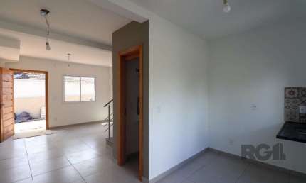 Casa em condomínio fechado com 2 quartos à venda na Rua Miguel Ascoleze, --, Vila Nova, Porto Alegre