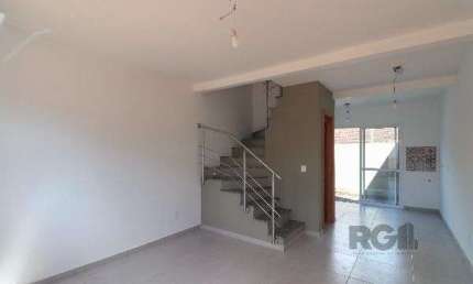 Casa Condominio em Porto Alegre, no bairro Vila Nova, com 2 dormitório(s), e 2 banheiros, à venda.
