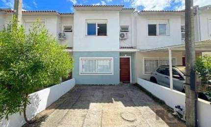 Casa com 3 quartos à venda na Avenida Edgar Pires de Castro, --, Hípica, Porto Alegre