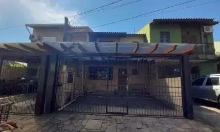 Casa em Porto Alegre, no bairro Hípica, com 3 dormitório(s), à venda.