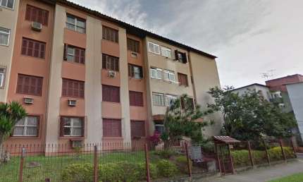 Apartamento com 02 quartos e 01 vaga escriturada no Bairro Rubem Berta